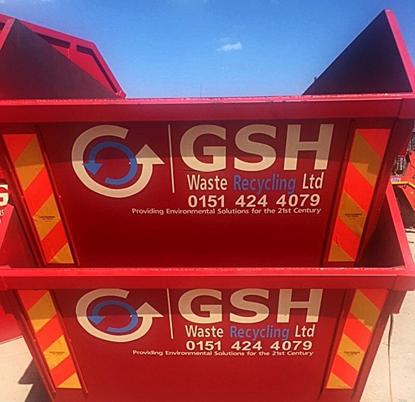 Skips stacked in the sun, ready for domestic skip hire for summer house clearances.